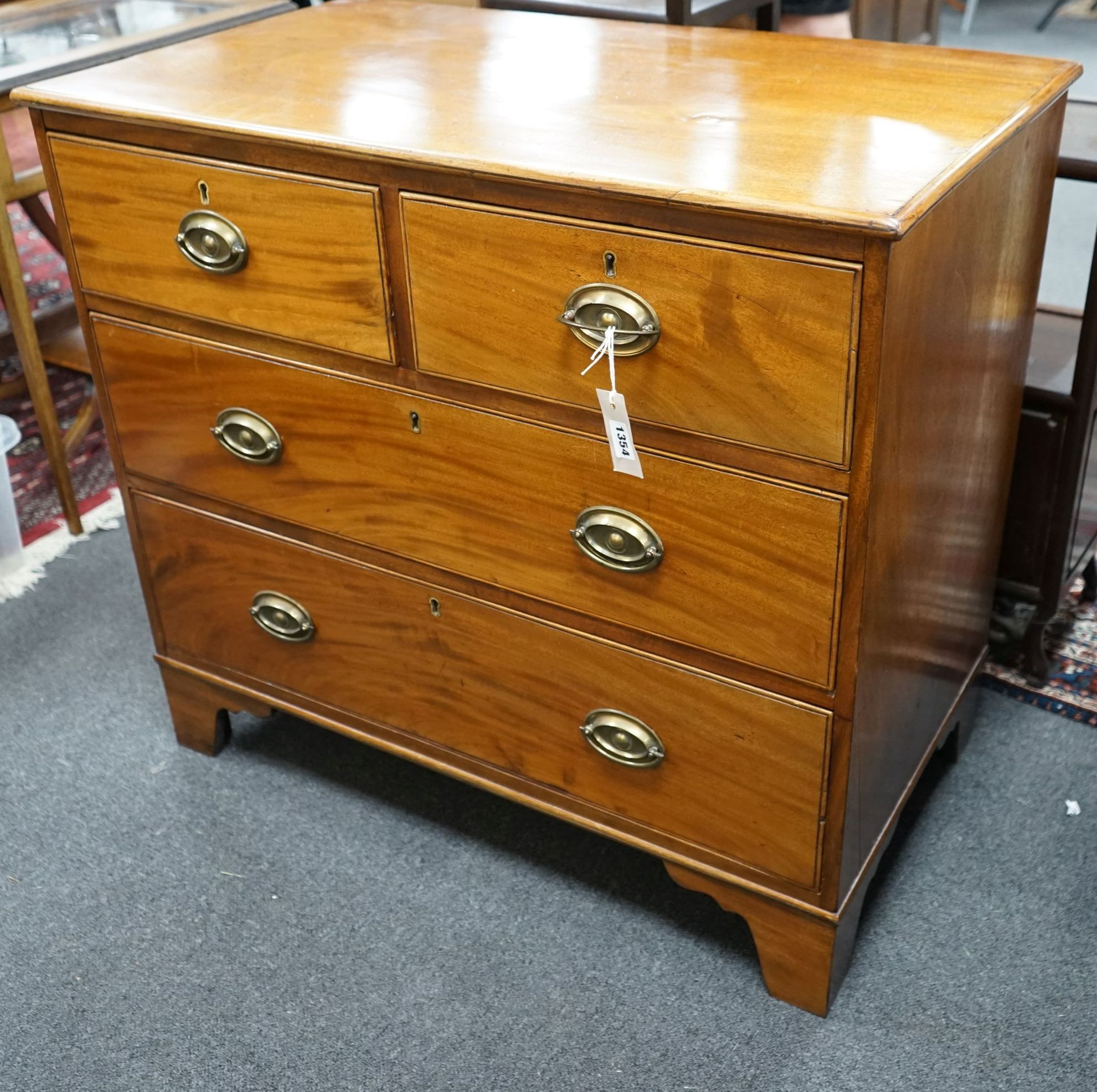 A small Regency mahogany chest, width 88cm, depth 48cm, height 80cm